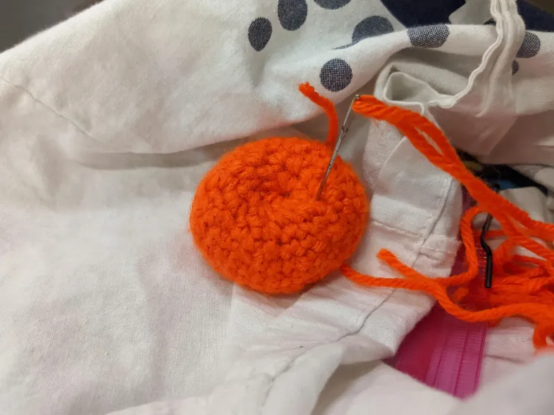 Tangerine bound in yarn